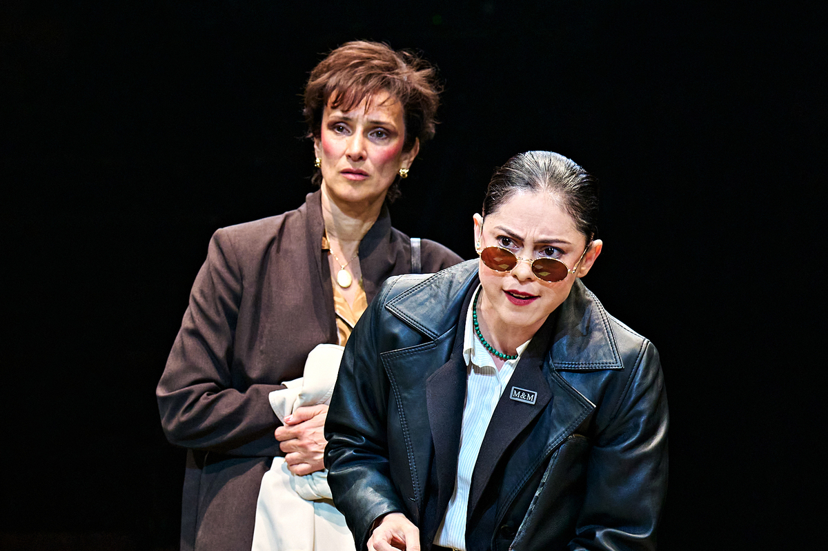 Indira Varma (Levene) and Rosa Salazar (Roma) in Glengarry Glen Ross at The Old Vic (2026). Photo by Manuel Harlan
