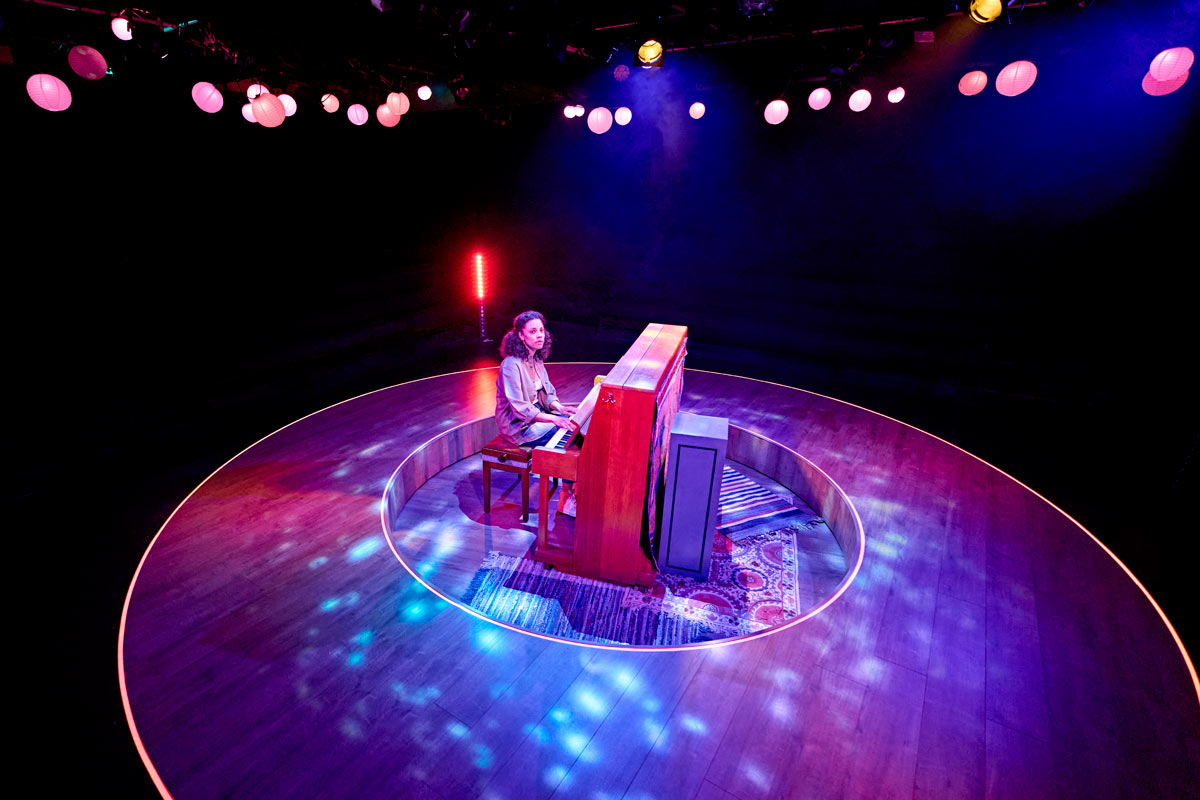 Anoushka Lucas sat at piano in Elephant at Menier Chocolate Factory. Credit Manuel Harlan