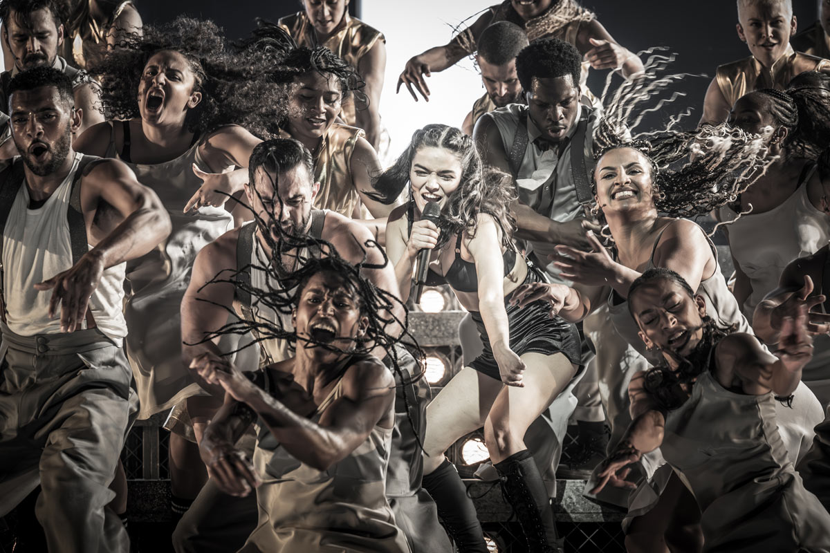 Rachel Zegler (Eva Perón) &amp; cast of Evita. Credit - Marc Brenner.
