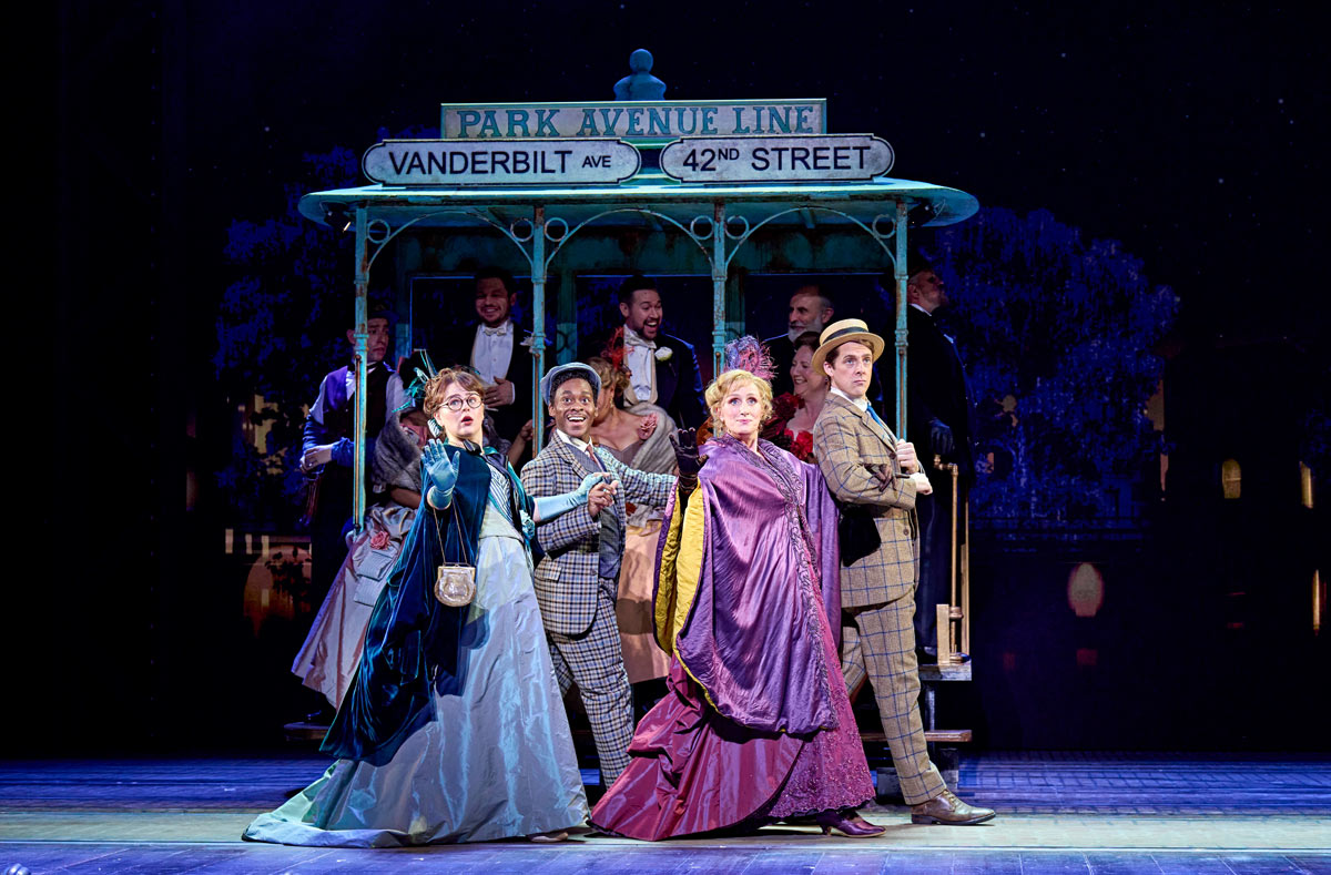 Emily Lane, Tyrone Huntley, Jenna Russell, and Harry Hepple in &lt;em />Hello, Dolly!</em> at the London Palladium (Credit Manuel Harlan)