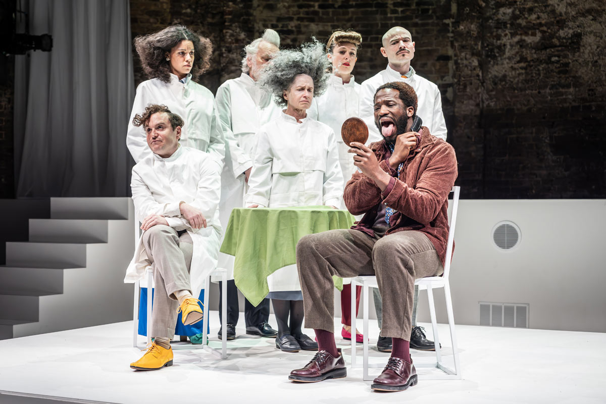 Joshua McGuire, Anoushka Lucas, Alan Wiliams, Hayley Carmichael, Sophie Steer, John Biddle and Ṣọpẹ́ Dìrísù in Rhinoceros at the Almeida. Photo Marc Brenner.