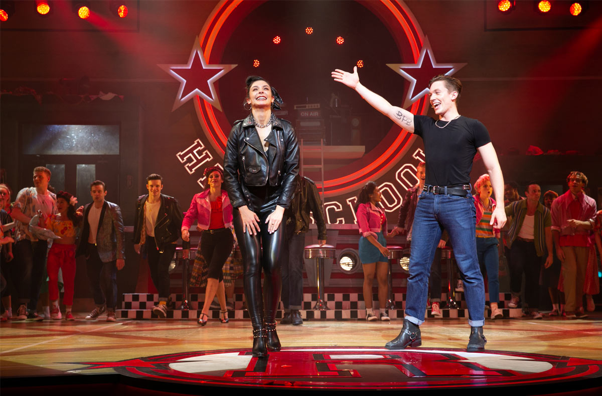 Olivia Moore &amp; Dan Partridge during the curtain call at press night for GREASE, credit Piers Allardyce